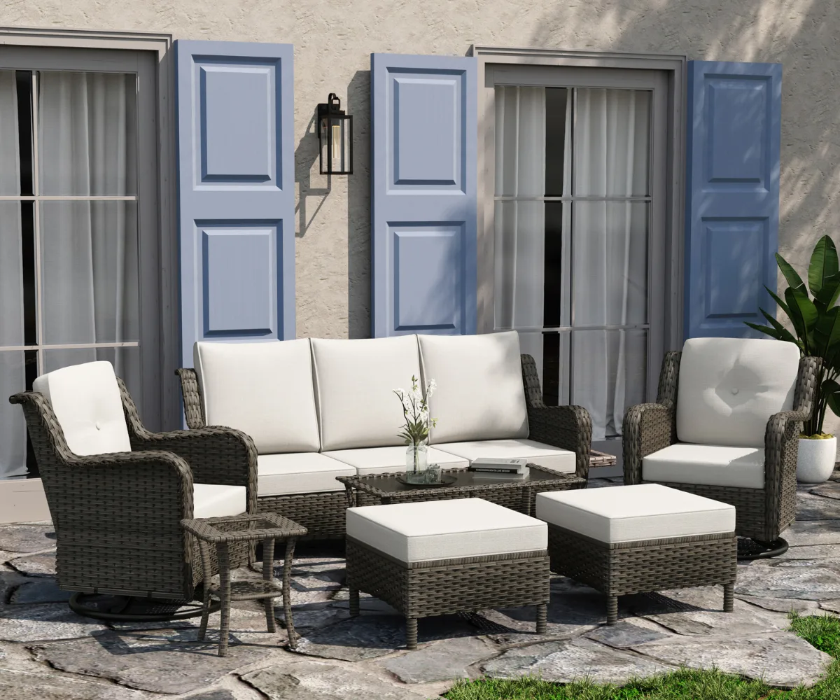 Dreamsidea's all-weather wicker patio set, featuring a deep seating sofa, swivel rocker chairs, an end table and two ottomans.