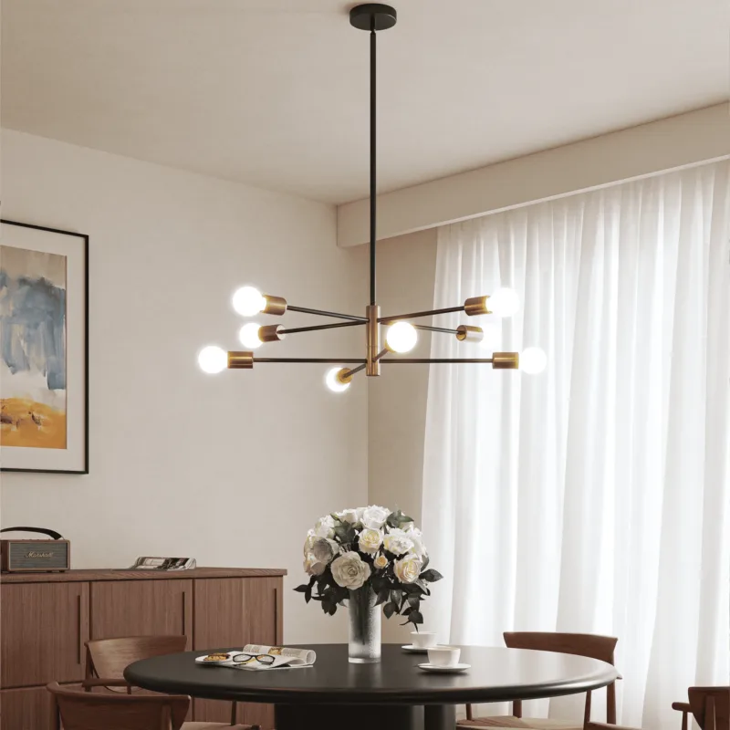 A modern black and brass sputnik chandelier from Dreamsidea's lighting collection hanging over a dining table.