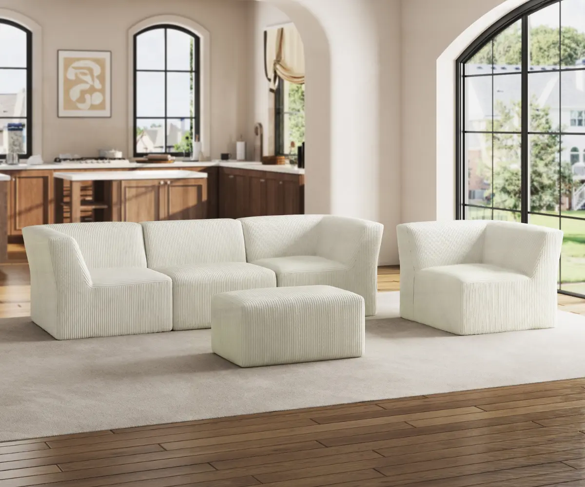 A cozy modular sofa with a corner chair and ottoman from Dreamsidea in a soft white ribbed fabric.
