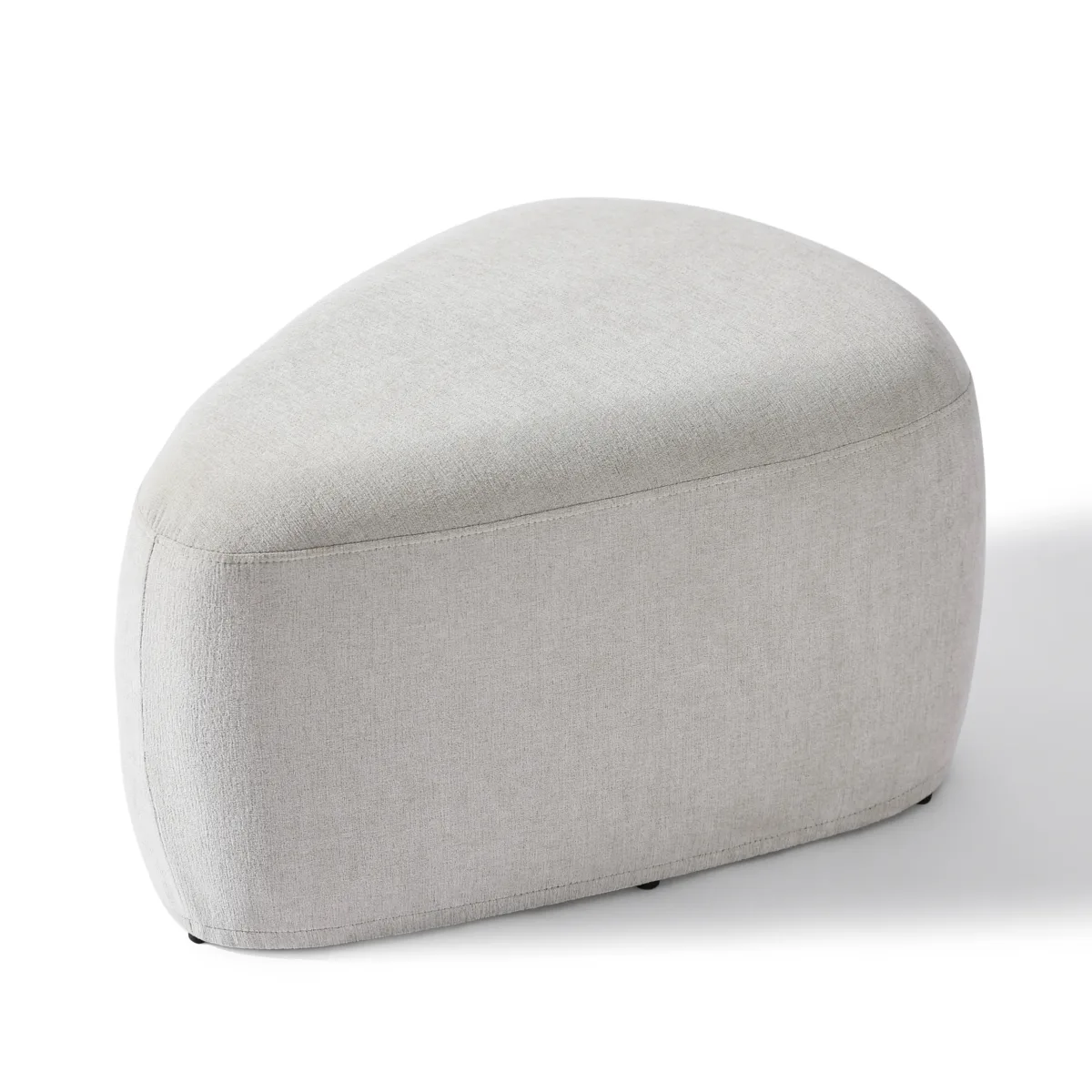 Adna Triangular Upholstered Ottoman - Image 1