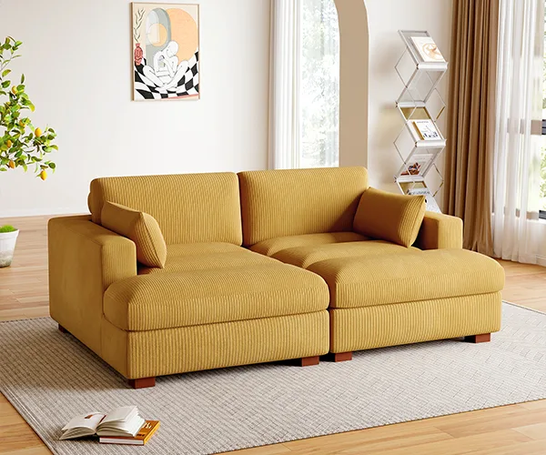 A sunlit room featuring a cozy sectional sofa with chaise in mustard yellow corduroy, a signature piece from Dreamsidea.