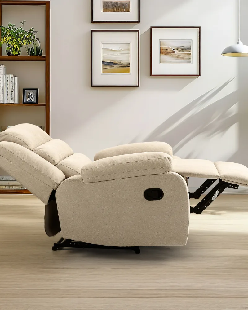 A side view of Dreamsidea's cream fabric recliner chair with its padded backrest and footrest fully extended for relaxation.